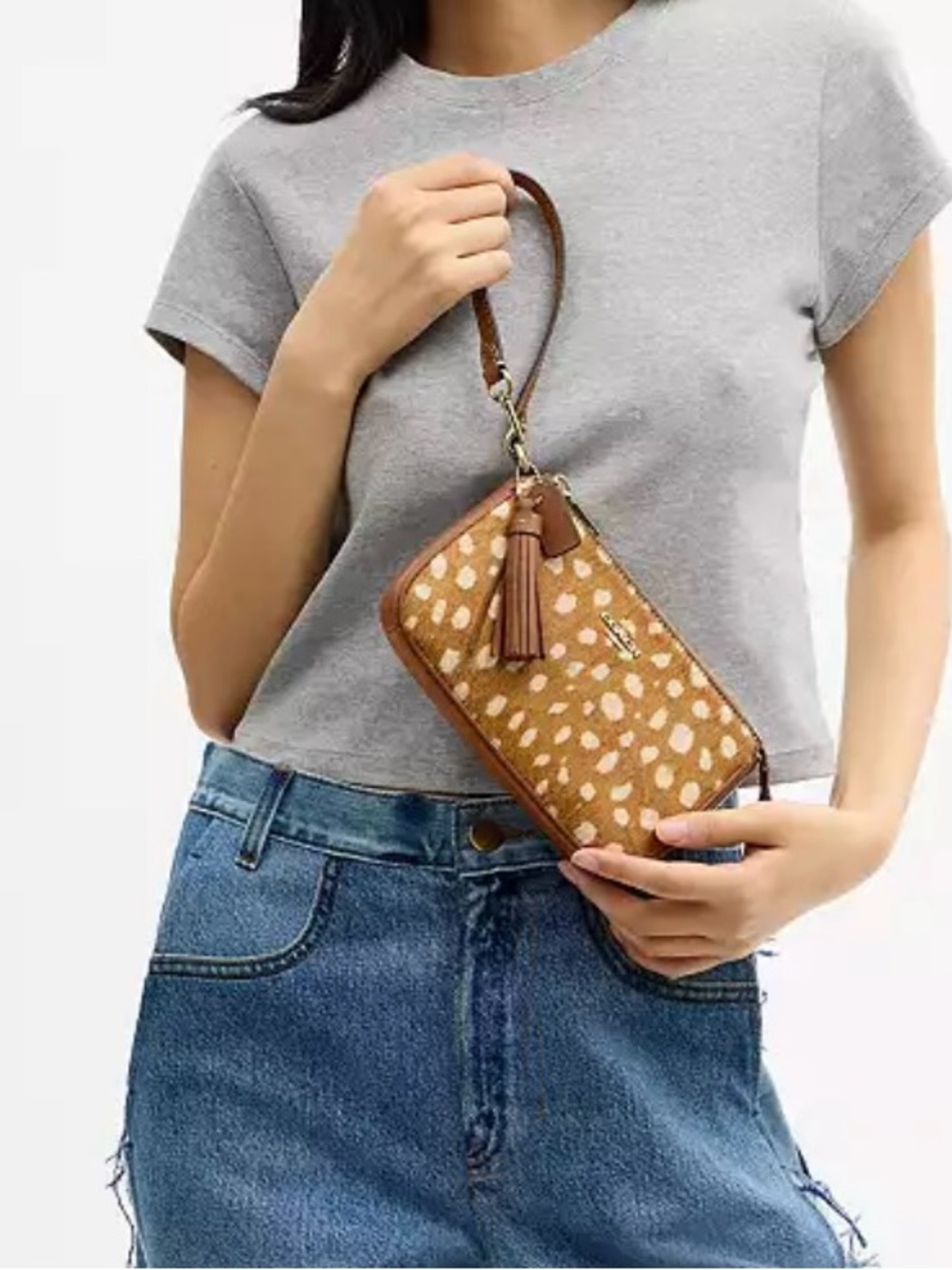 NWT Coach Nolita 19
With Deer Print And Extra Tassel